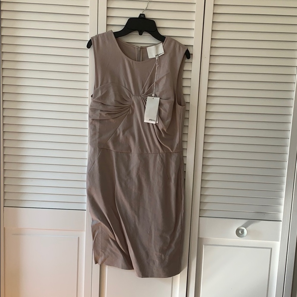 tan colored dress with twist in front